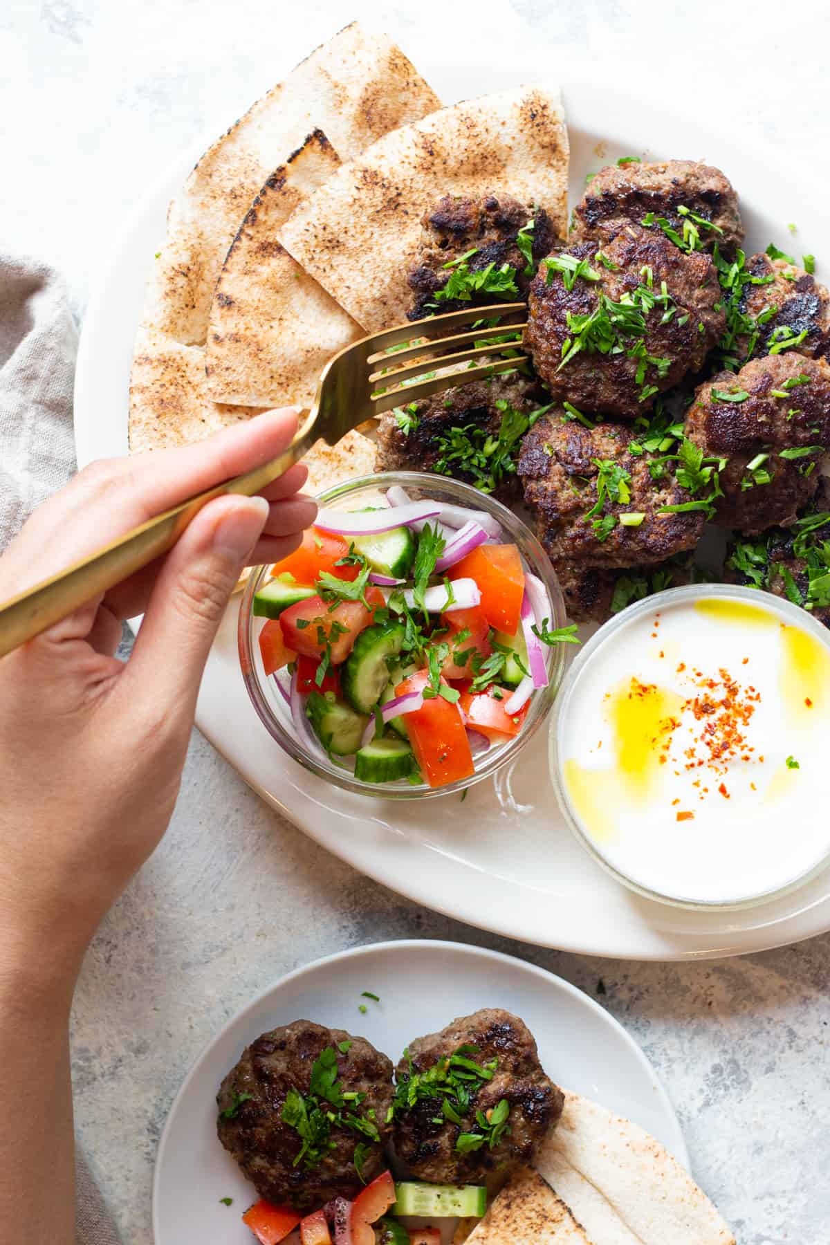 This is the best kofta kebab recipe! So easy and simple, made with just a few ingredients and ready in no time! These koftas are juicy and so delicious. For the perfect meal serve them with pita, salad and a delicious yogurt sauce.