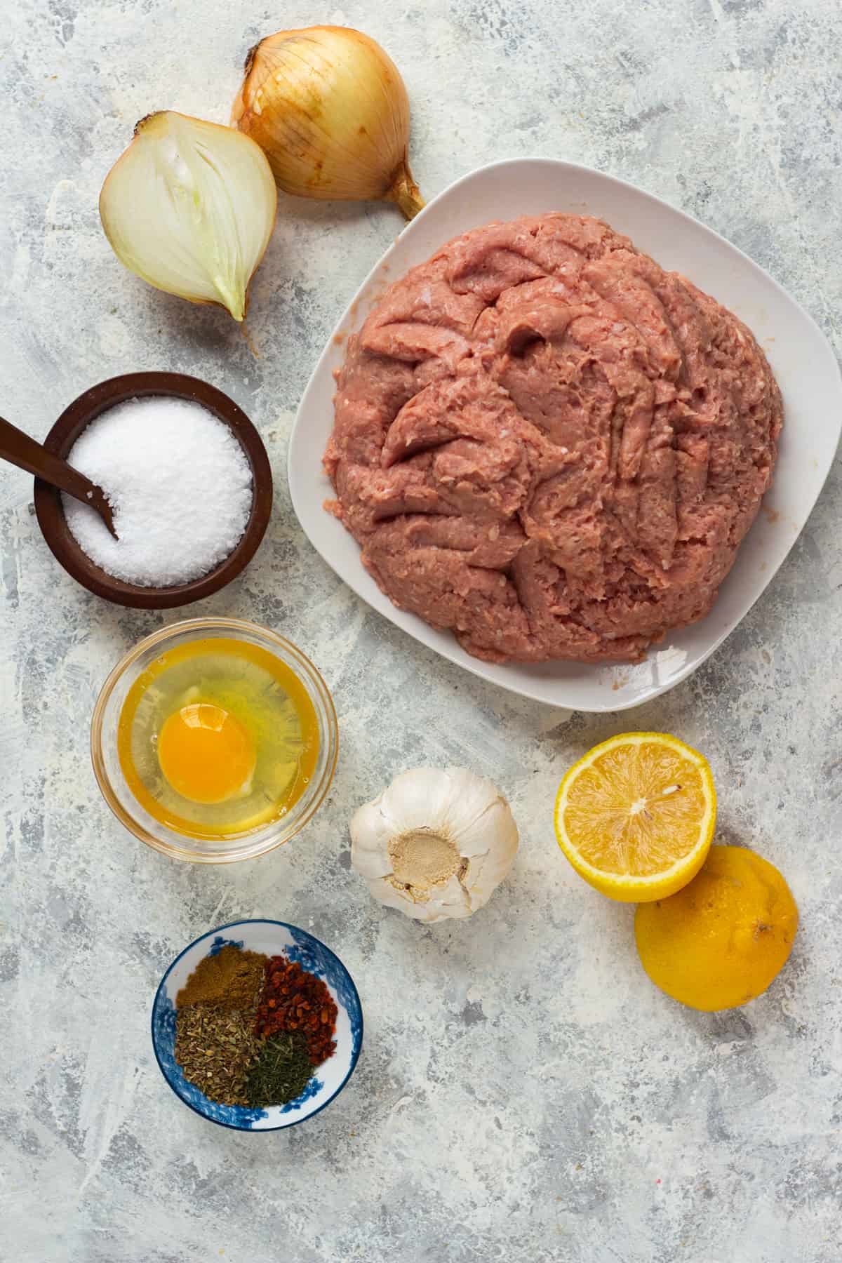 Oven baked turkey meatballs with a Mediterranean twist! These healthy baked meatballs are perfect for a quick dinner or meal prepping and are ready in no time! You can serve them with rice or pita bread, tomatoes, cucumbers and tzatziki! Simple yet so delicious! 