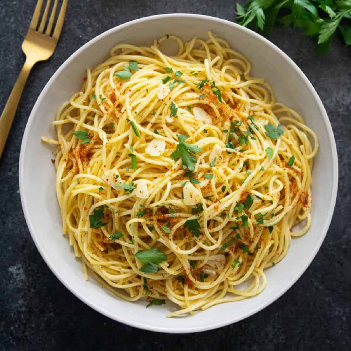 Ready in 20 minutes, spaghetti aglio e olio is a classic Italian pasta dish that only requires a few ingredients. It's one of those inexpensive weeknight meals that proves that simple can be delicious!
