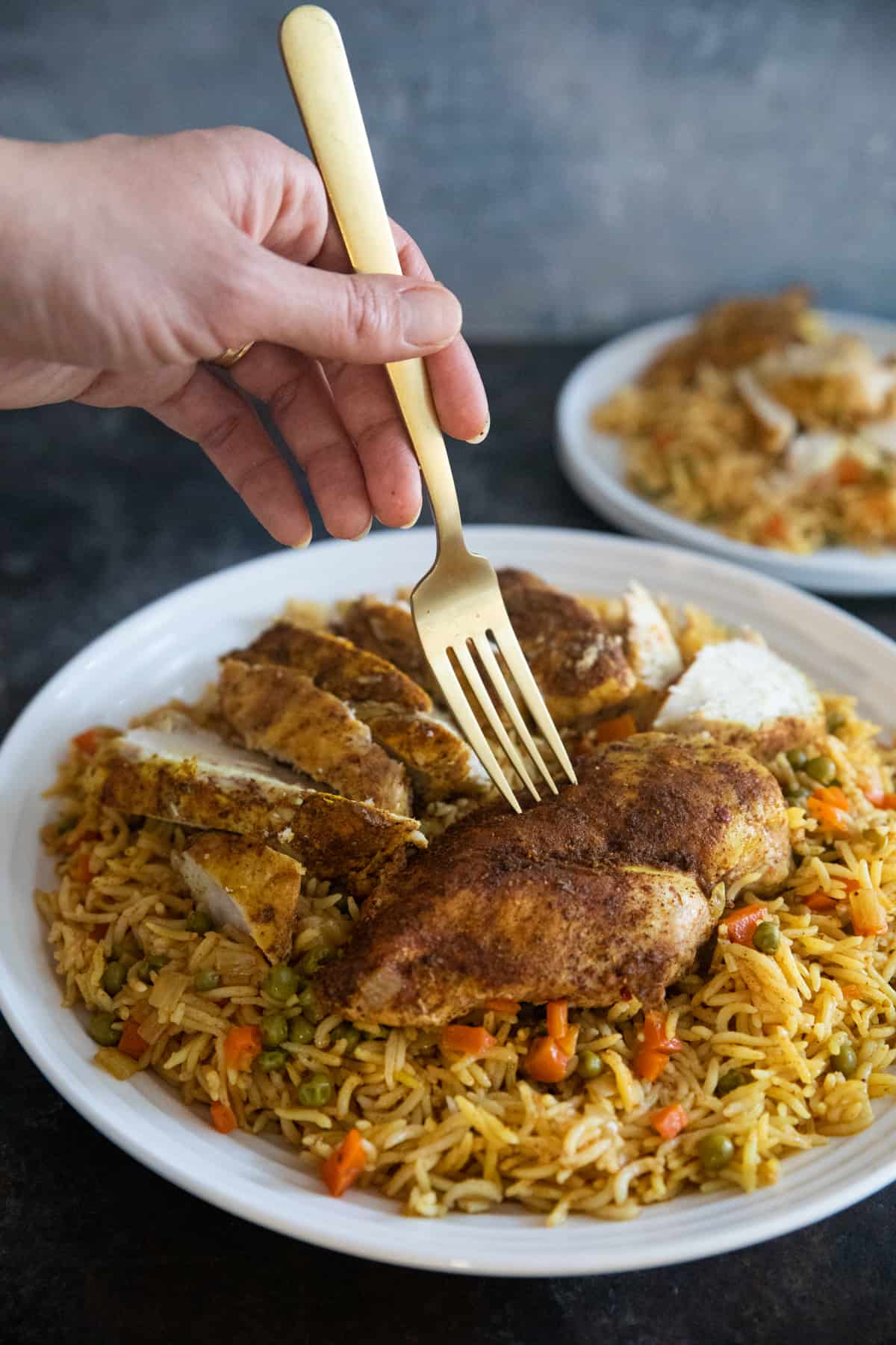 Middle Eastern chicken and rice on a plate. 