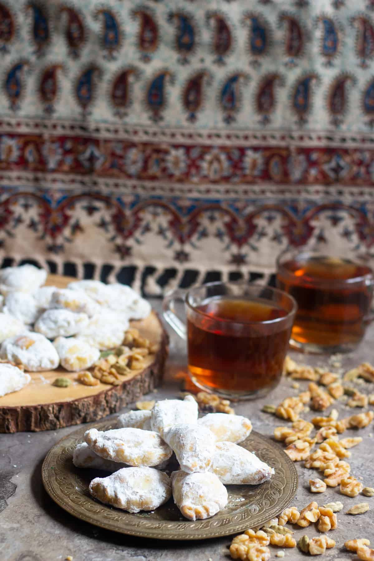 Qottab is a Persian pastry filled with walnuts is a delicious traditional treat from Iran. Delicate and flaky dough is filled with a combination of walnuts and cardamom - making this the perfect Persian dessert!