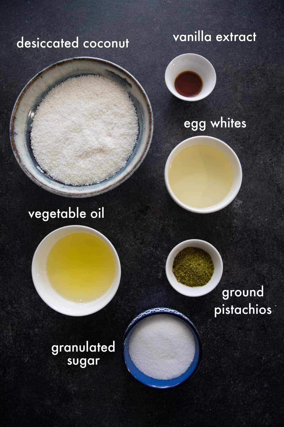 to make this recipe you need desiccated coconut, egg whites, sugar, oil and vanilla. 