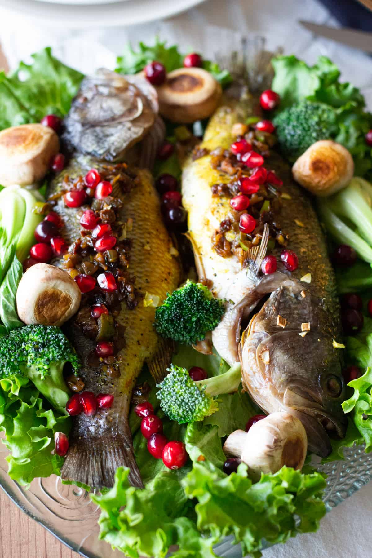 Persian Style stuffed branzino is a very special recipe that's bursting with amazing flavors. The filling includes walnuts and pomegranates which gives it a great crunch and taste!