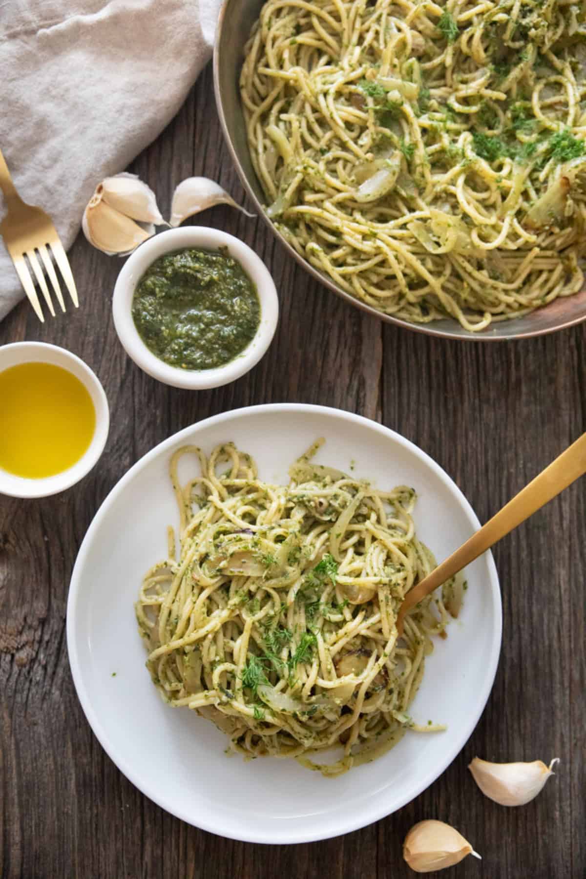 overhead shot of pasta with pesto.