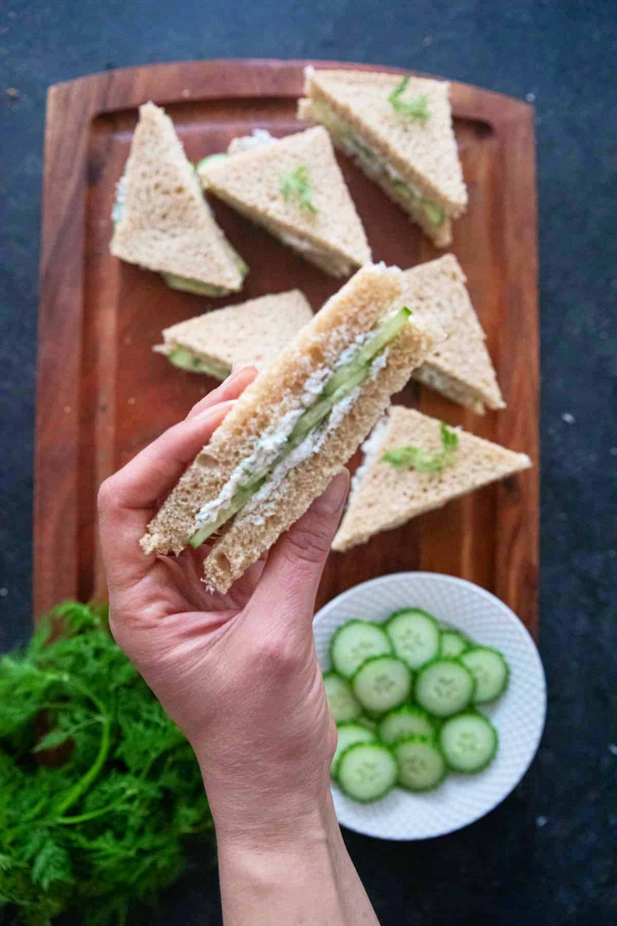 A piece of cucumber sandwich. 