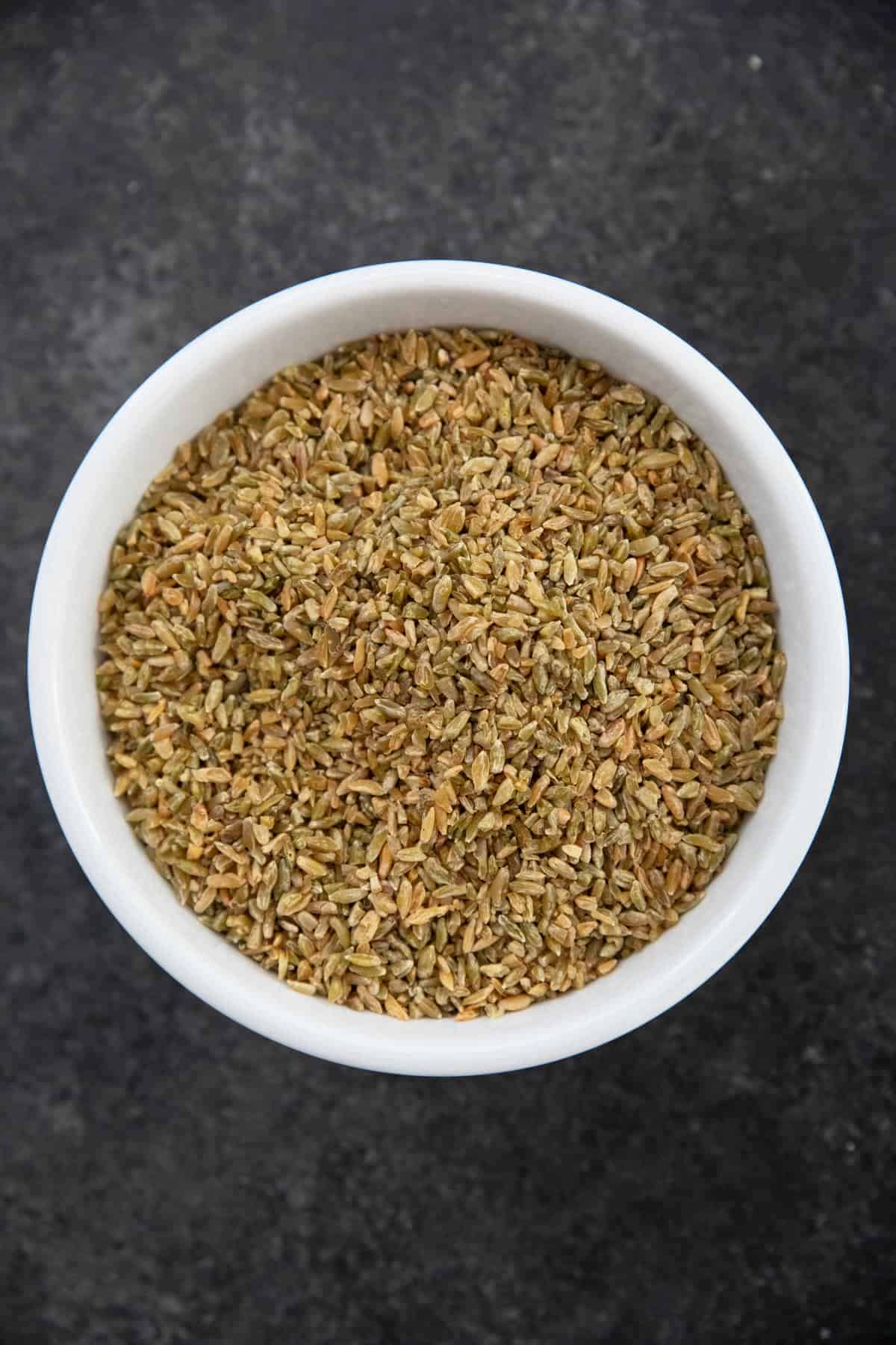 Uncooked freekeh in a bowl.