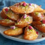 Qatayef on a plate.