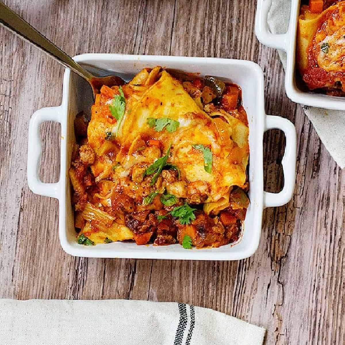 This cheesy lazy lasagna is the answer to "What should I make tonight?". It's made with ingredients that are already at hand plus a shortcut!
