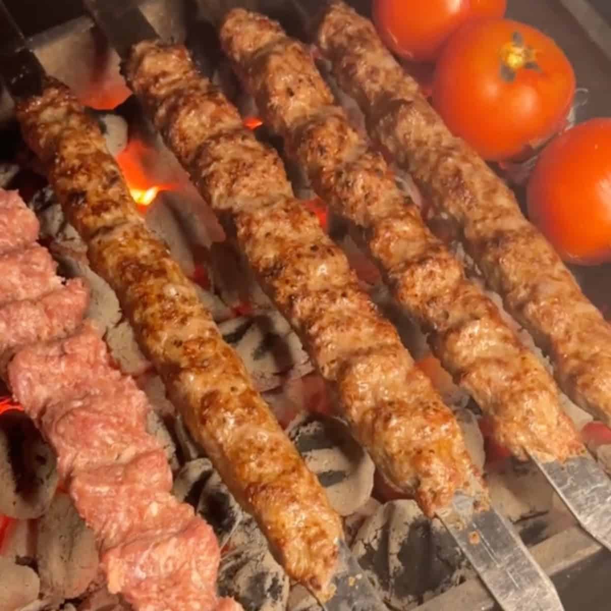 Once the grill is ready, place the skewers on the grill and continuously flip them to prevent the meat from falling off. Each kabob skewer should take about 3 to 4 minutes to cook, while the tomatoes will require approximately 15 minutes.
