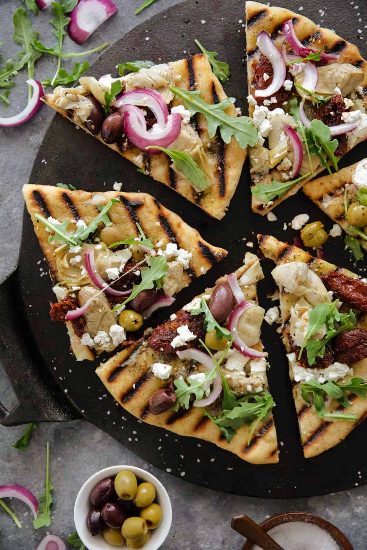 Mediterranean style pizza on the grill. 