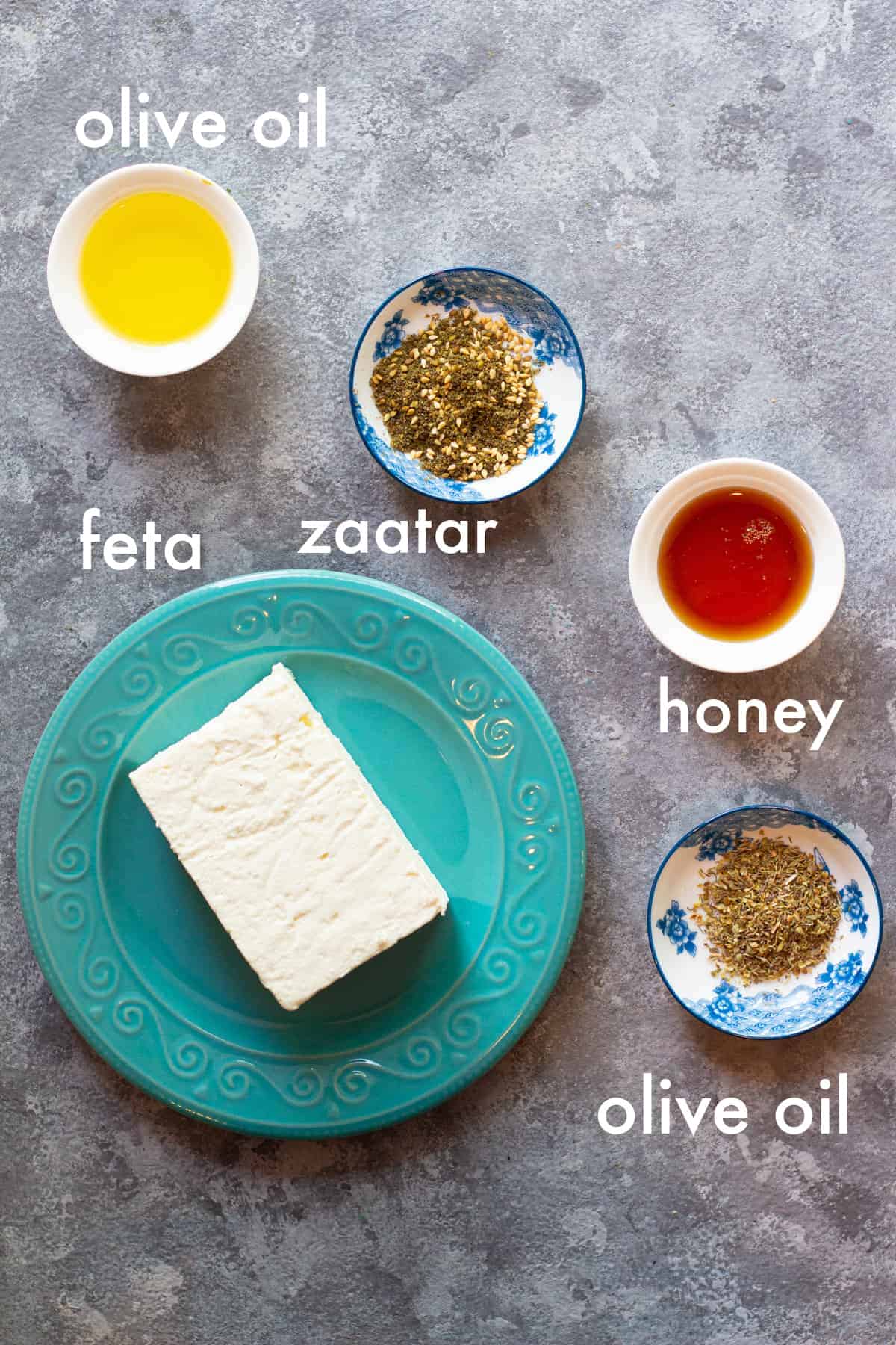To make this recipe you need feta, zaatar, honey, olive oil and oregano. 