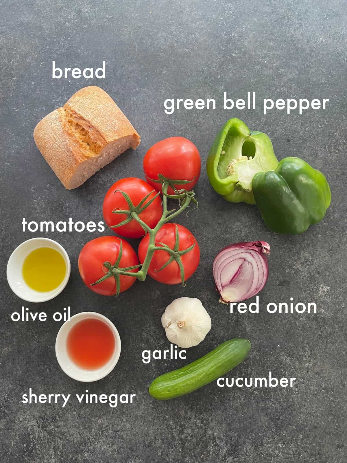 To make this recipe you need bread, tomatoes, green bell peppers, olive oil, sherry vinegar, cucumber, onion and garlic. 