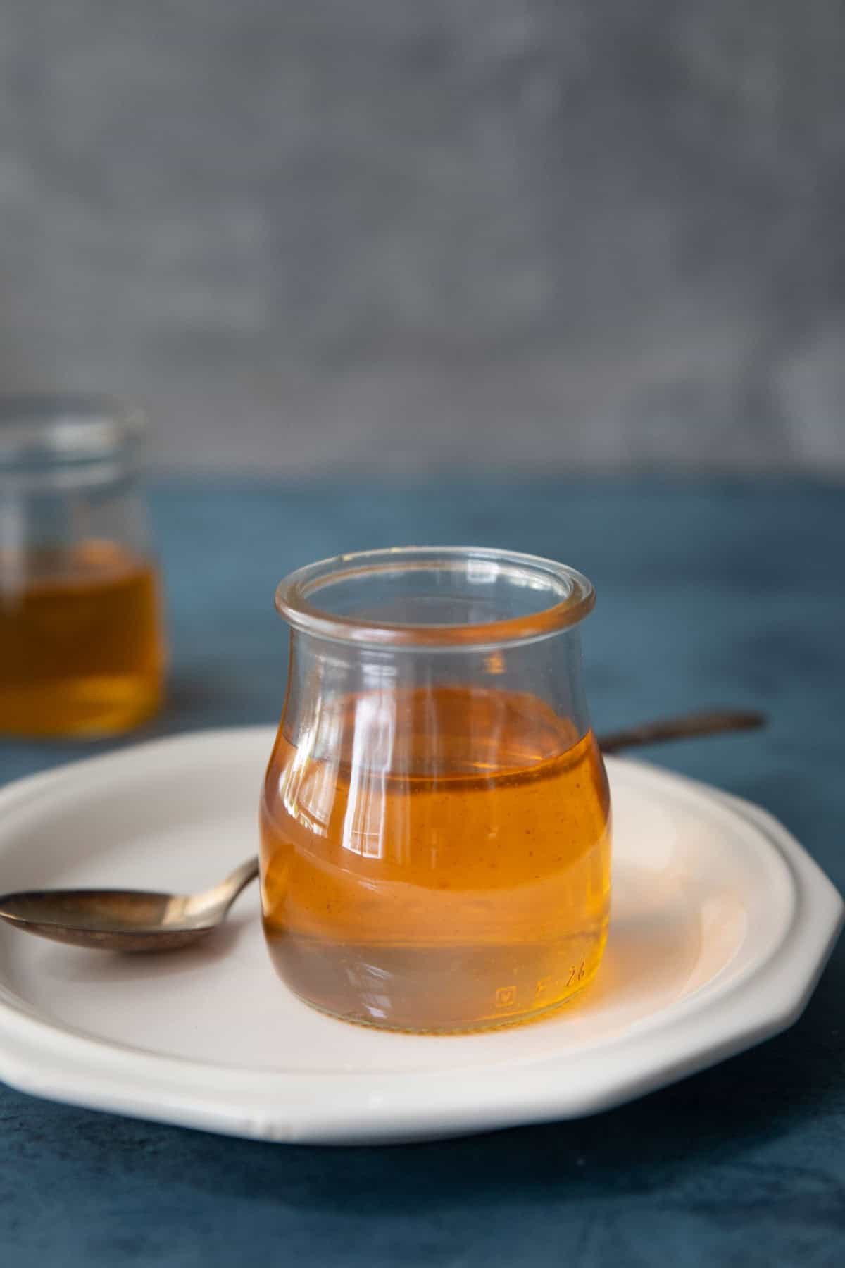 Golden saffron syrup on a plate. 