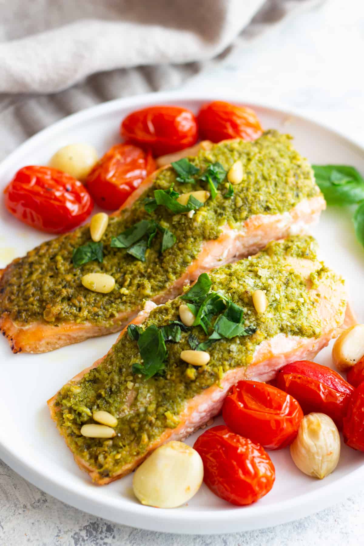 Here is an easy baked pesto salmon recipe that even picky eaters will love! Have dinner on the table within 25 minutes using this simple yet delicious recipe.