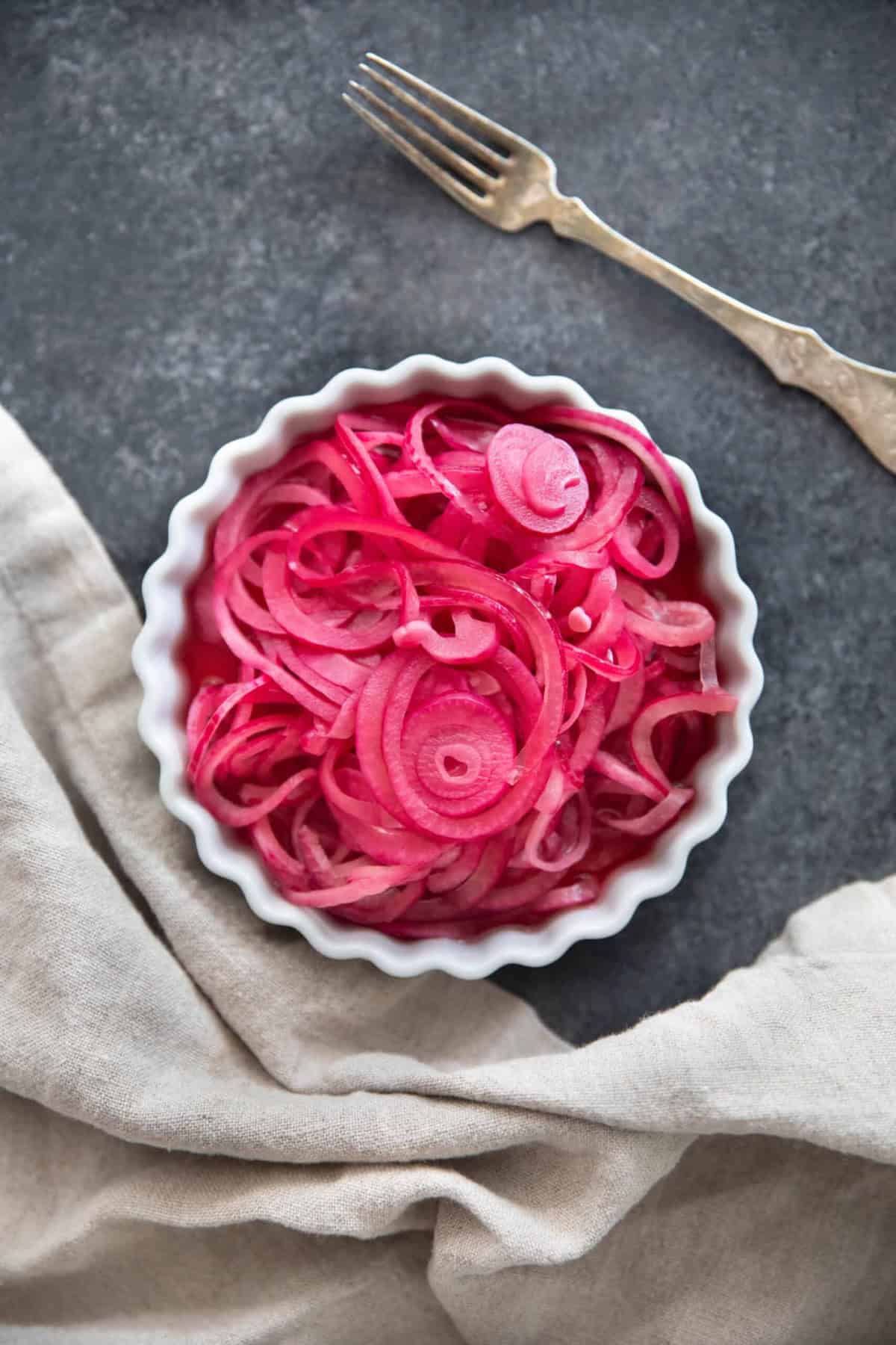 overhead shot of pickled red onions.