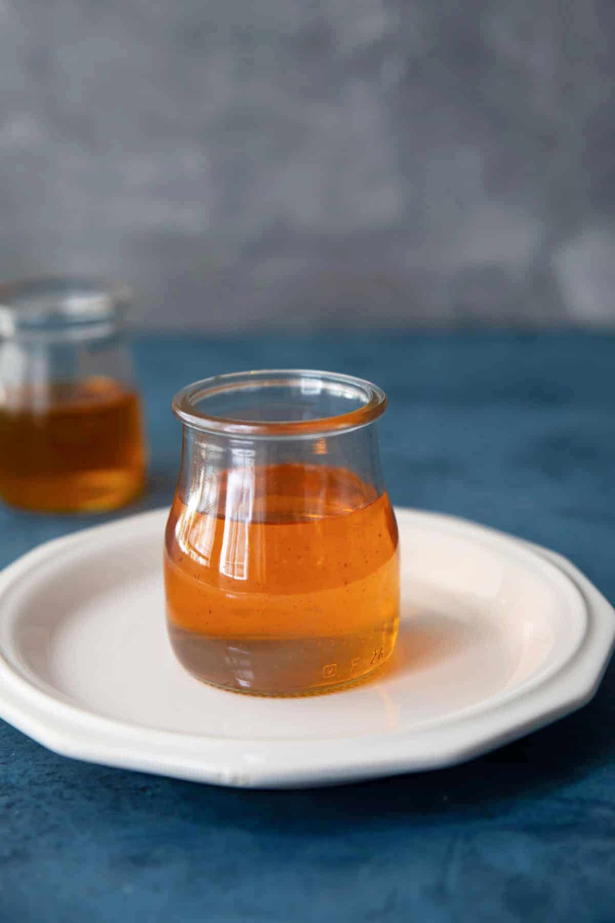 Golden saffron syrup on a plate. 