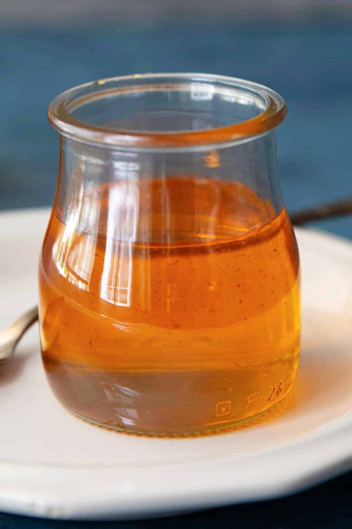 saffron syrup in a jar.