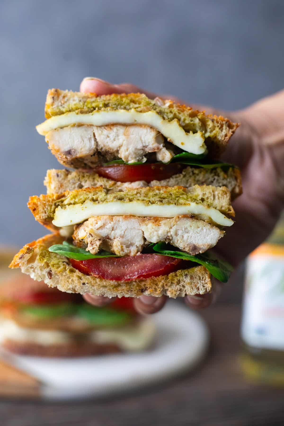 Front shot of chicken pesto sandwich. 