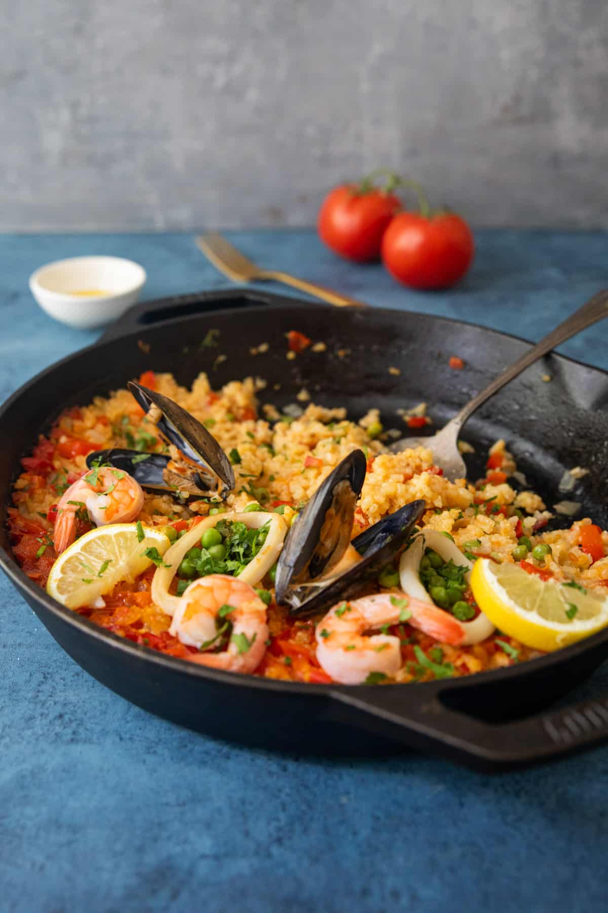 Front shot of paella in a pan. 