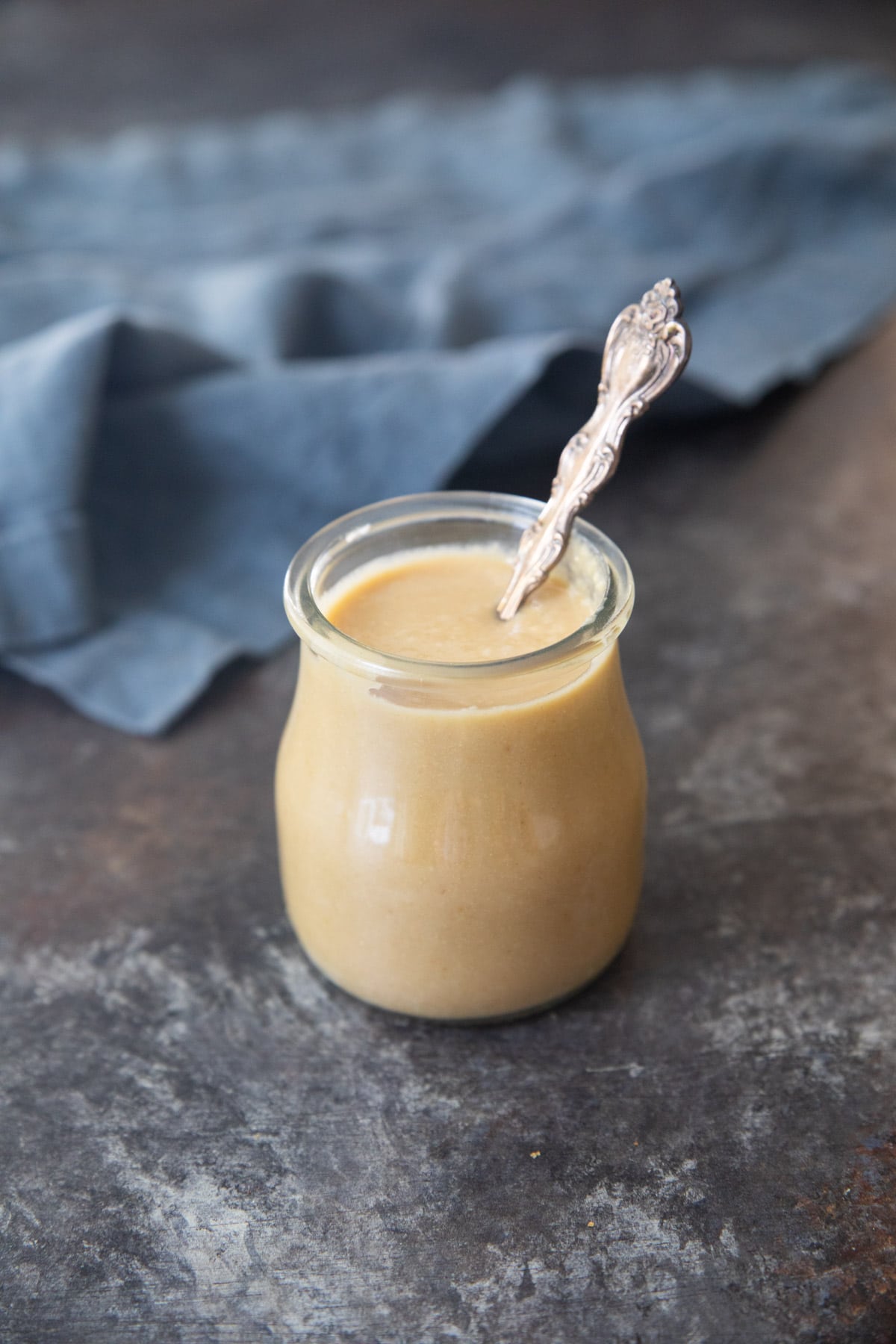 Tahini in a glass jar. 