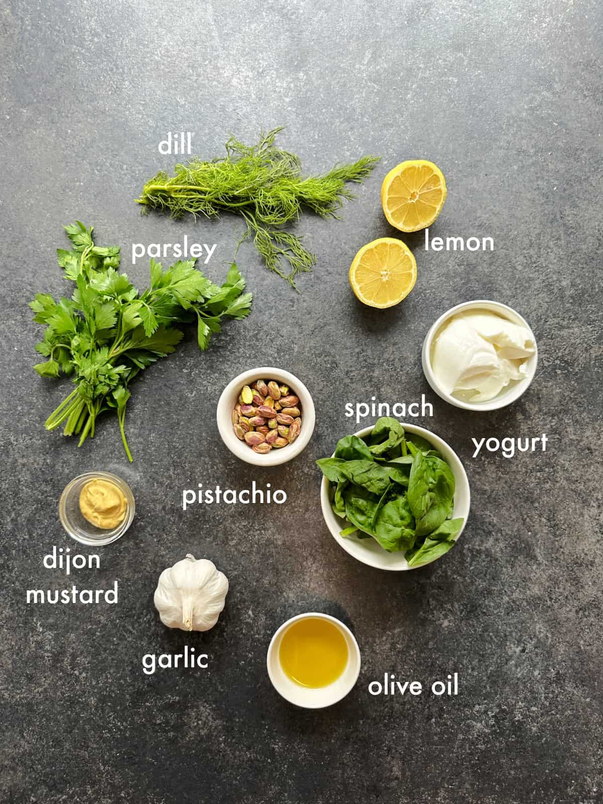 To make green goddess dressing you need spinach, herbs, lemon, garlic, olive oil mustard and pistachios. 
