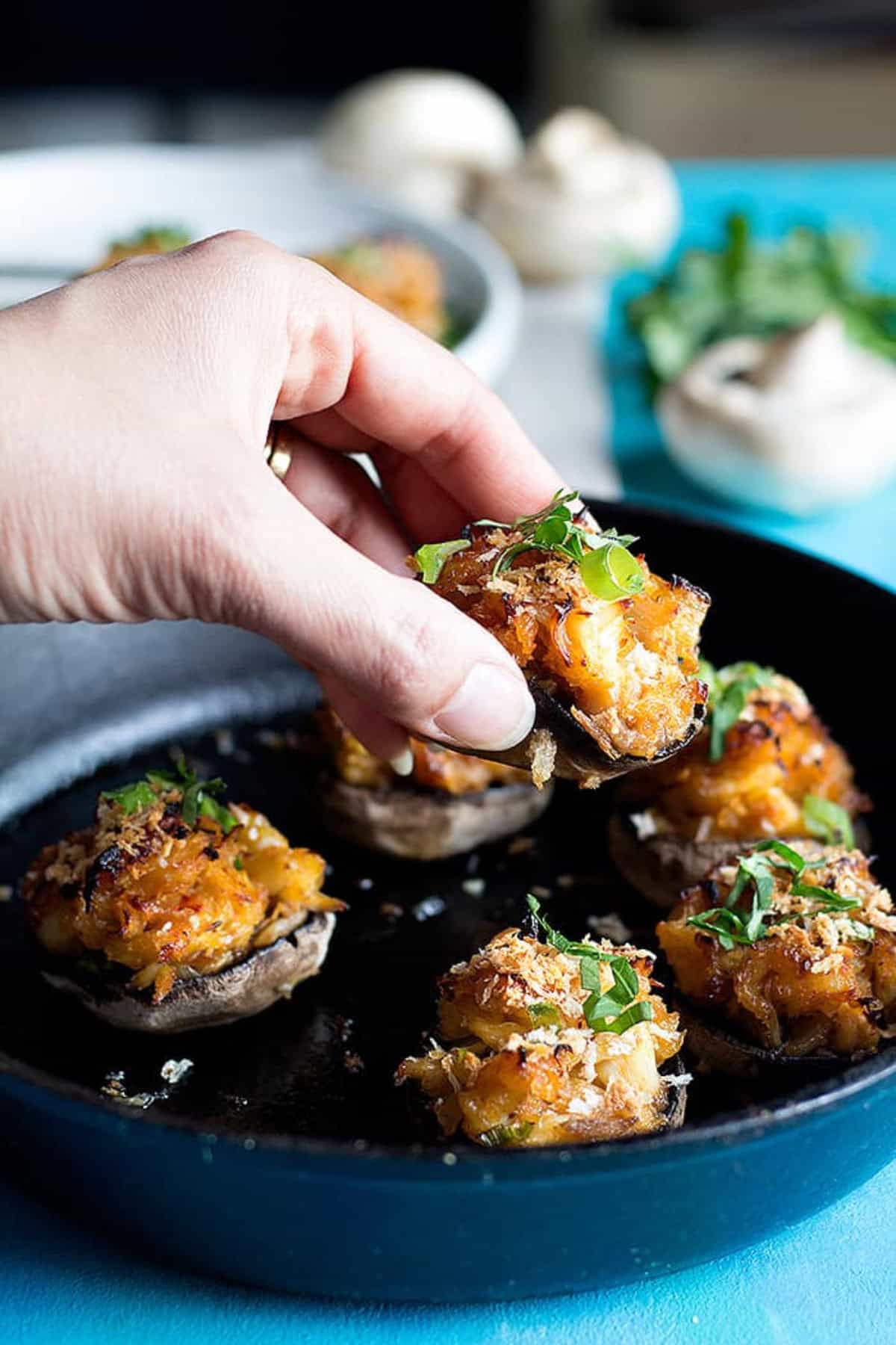 Spicy crab stuffed mushrooms are the perfect appetizer! Juicy mushrooms filled with a spicy crab filling are so delicious and easy to make.
