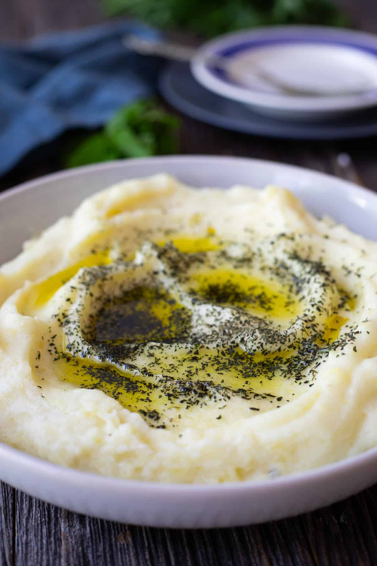 Front shot of olive oil mashed potatoes in a bowl.