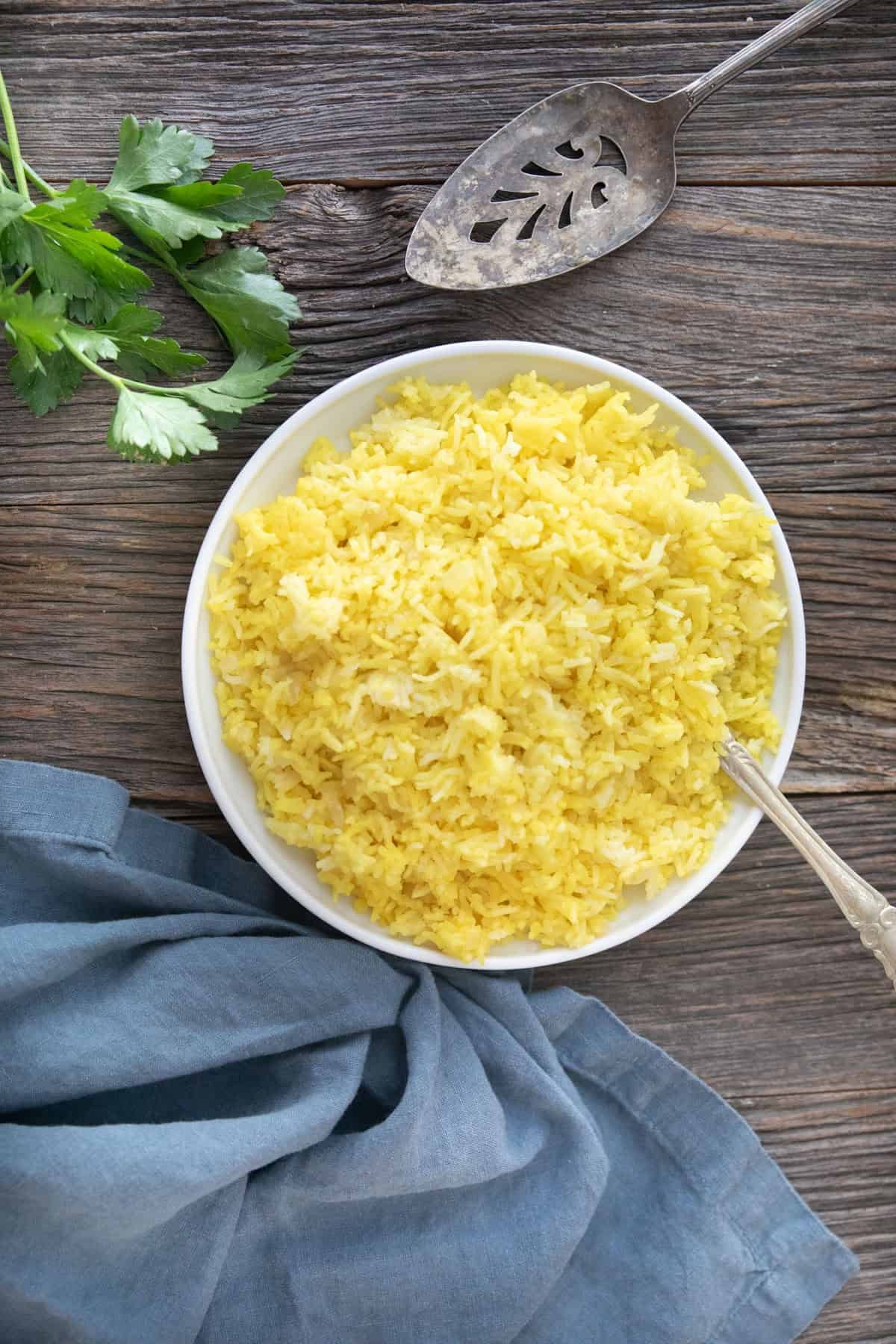saffron rice on a wooden background.