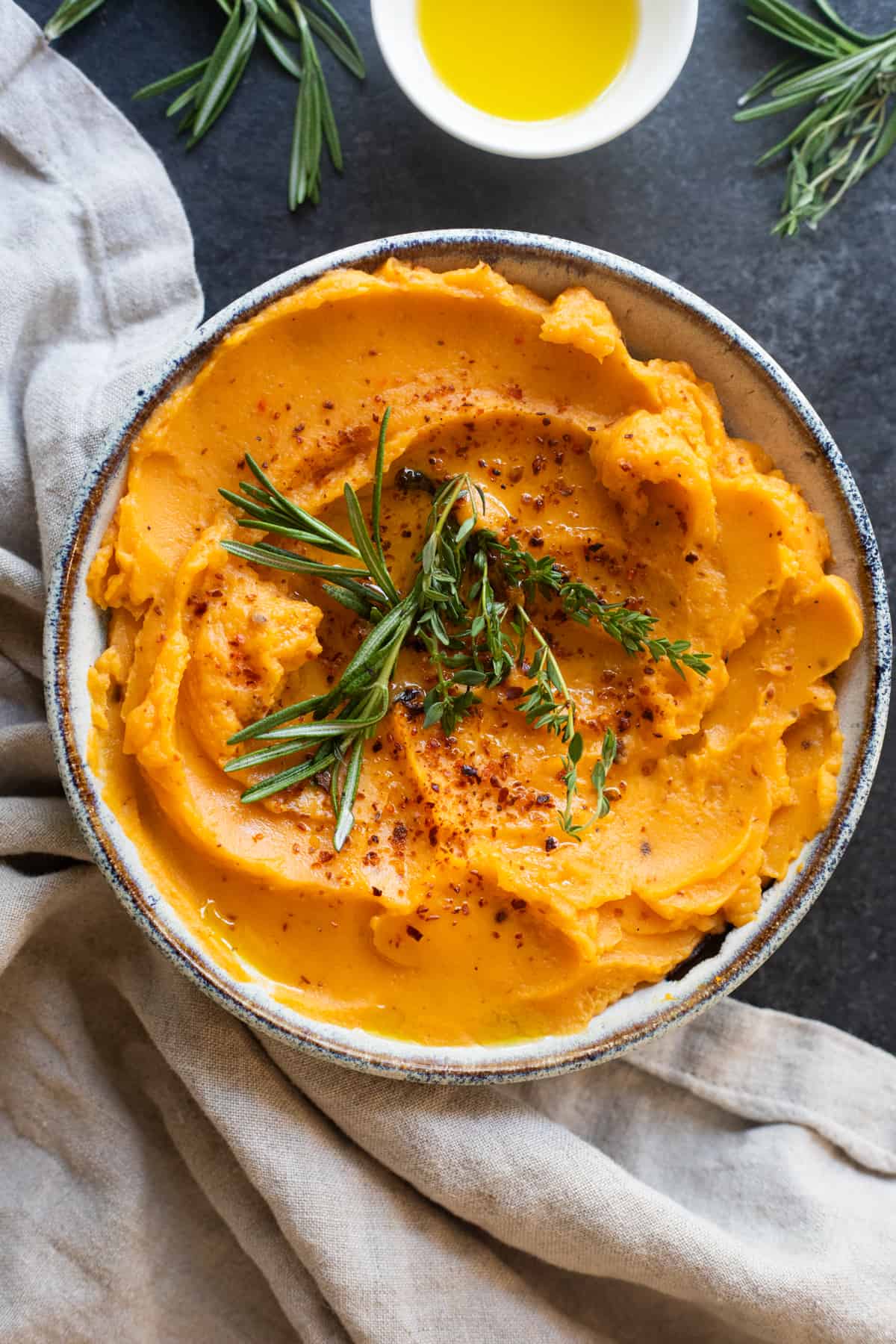 Mashed sweet potatoes in a bowl.