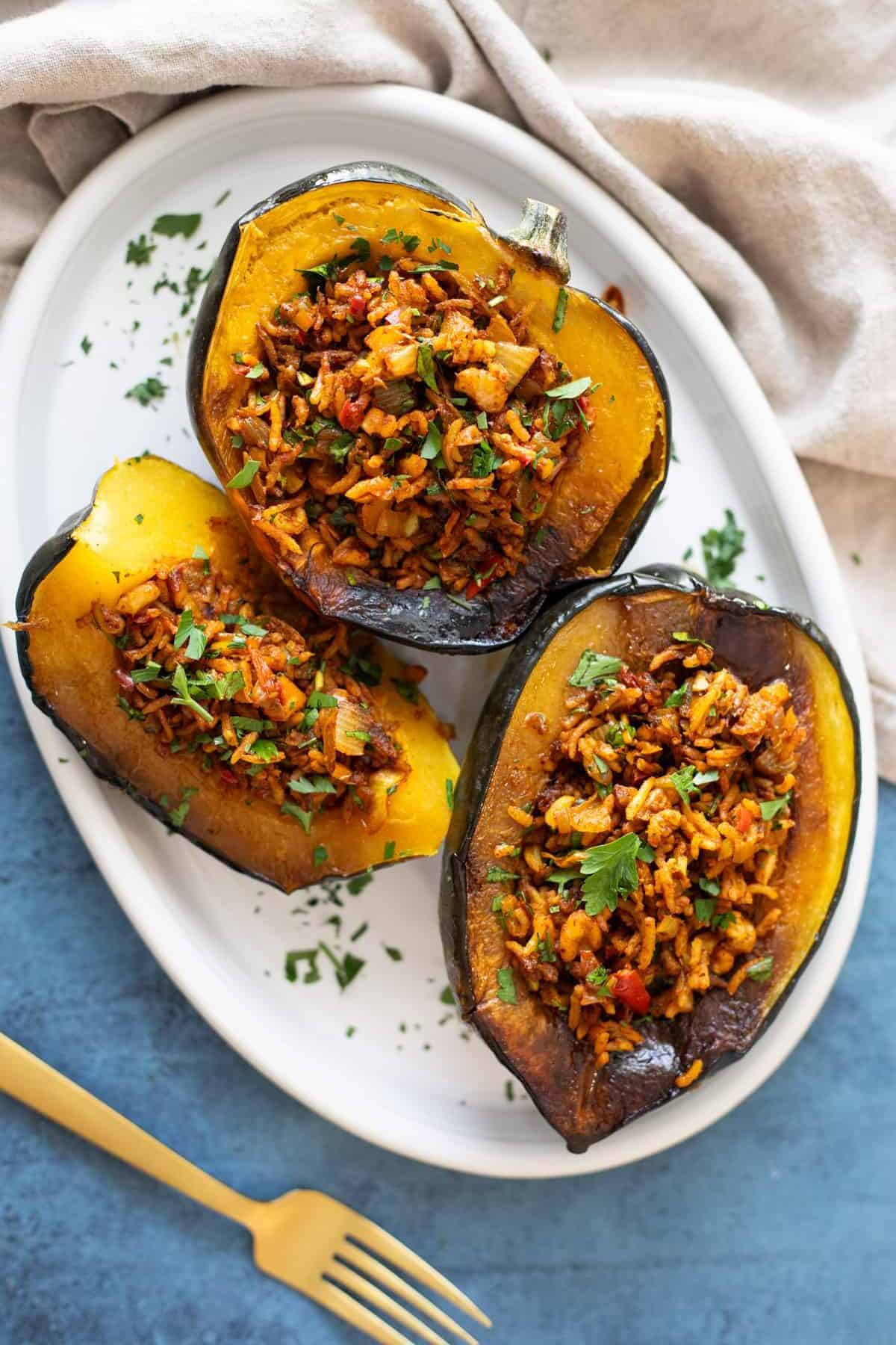 Overhead shot of stuffed acorn squash. 