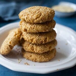 These tahini cookies are ready in 30 minutes. Sweetened with honey and coated in sesame seeds, these cookies are naturally dairy-free and egg-free.