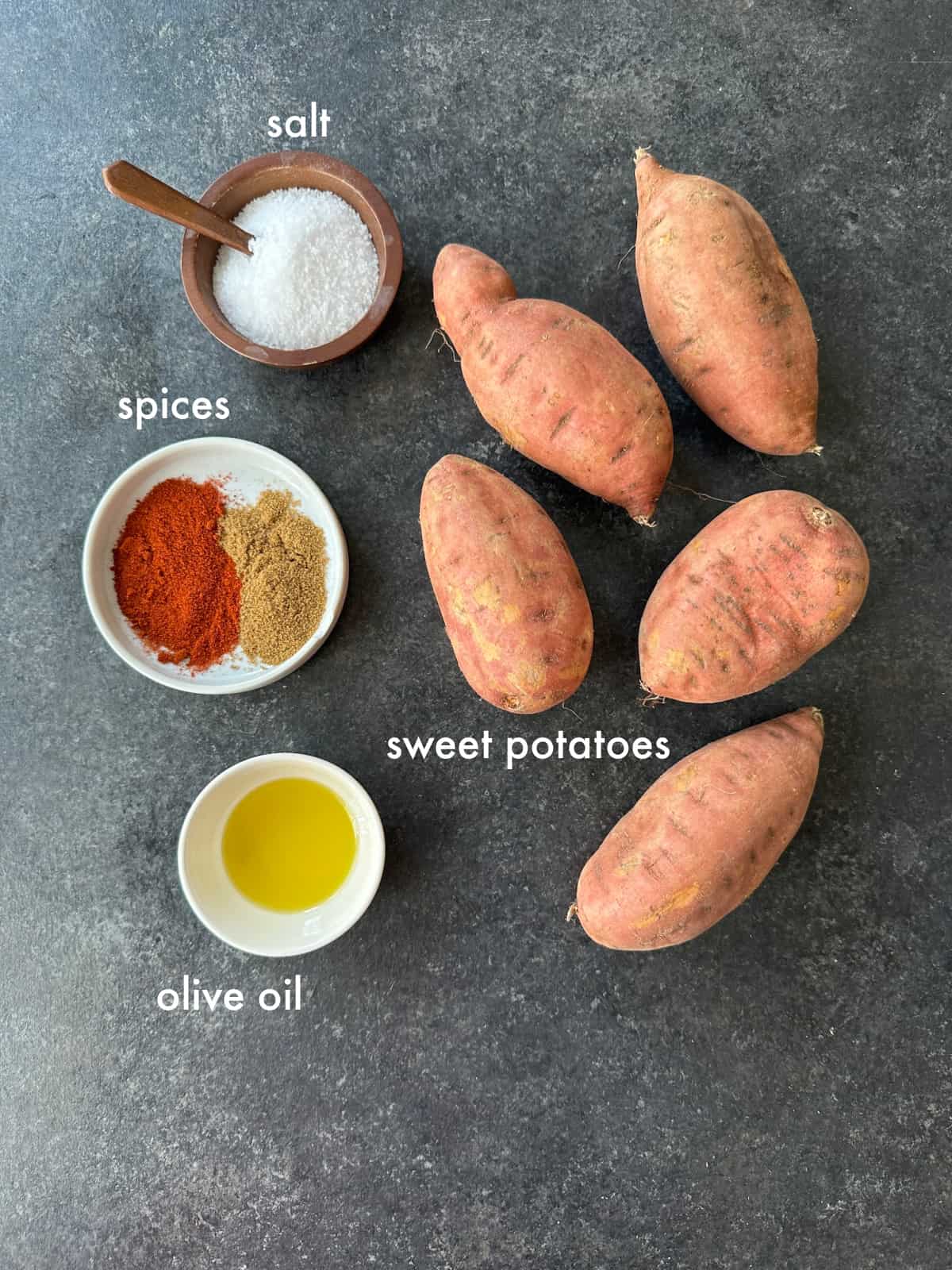 To make this recipe you need sweet potatoes, spices, olive oil and salt. 