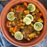 Moroccan chicken tagine in a clay pot.