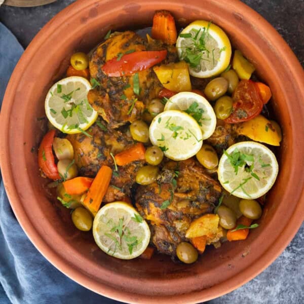 Moroccan chicken tagine in a clay pot.