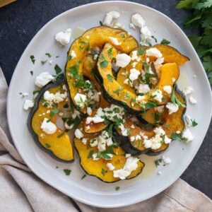 Roasted acorn squash is easy, simple and so delicious! Learn how to roast acorn squash that's tender and serve it as a side dish this season.