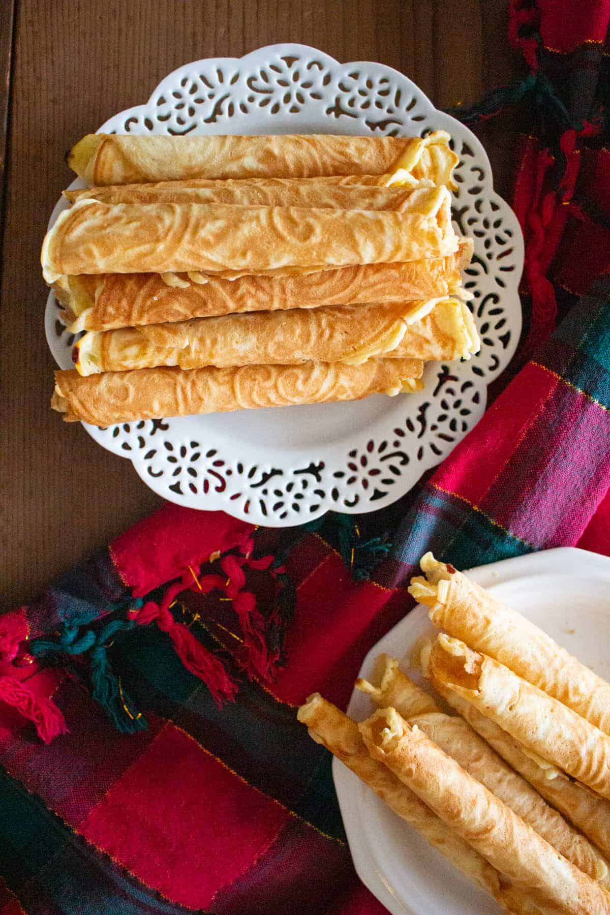 Krumkake is a delicate Norwegian cookie that is loved across generations and is perfect for the holidays. It's decadent, delicious and worth the effort. 