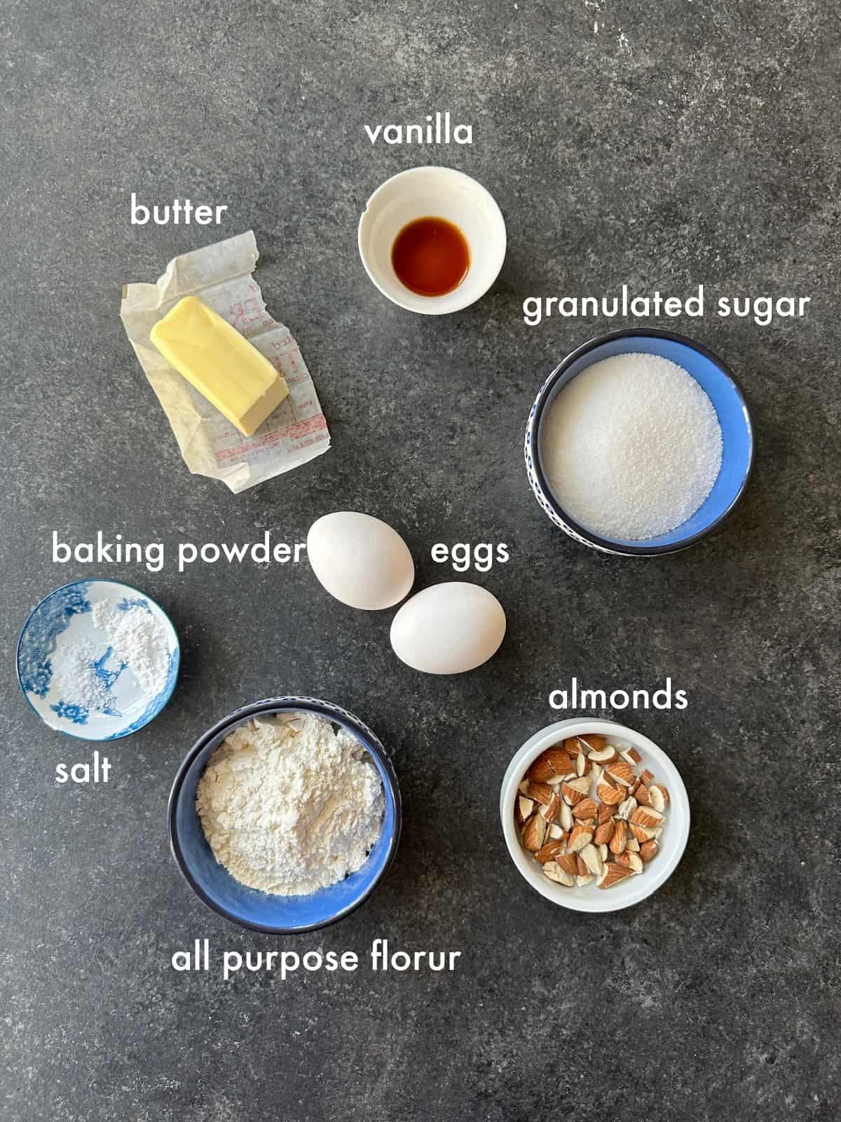 Biscotti ingredients are flour, sugar, salt, baking powder, eggs, butter and almonds. 
