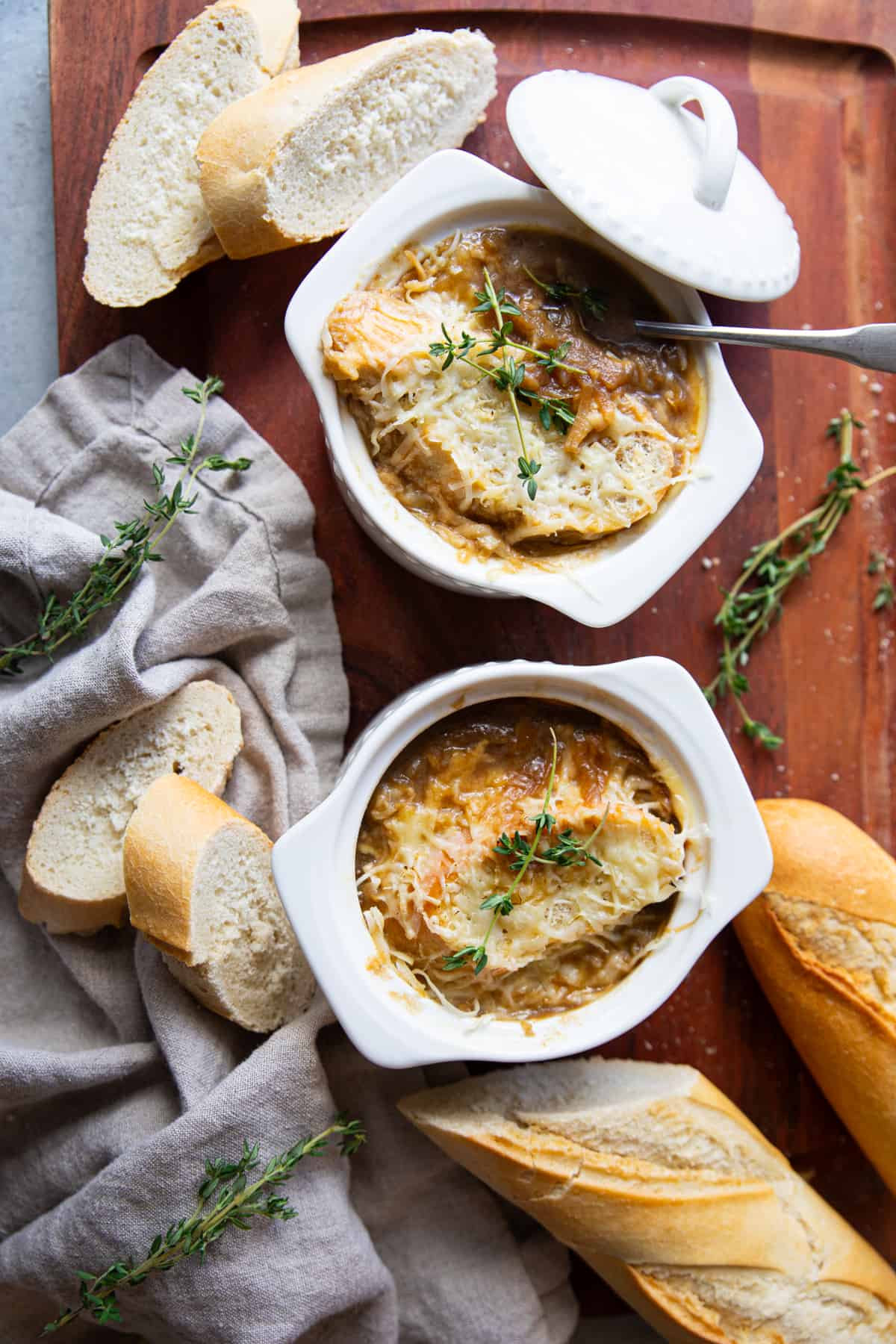 Overhead shot of French onion soup in two bowls. 