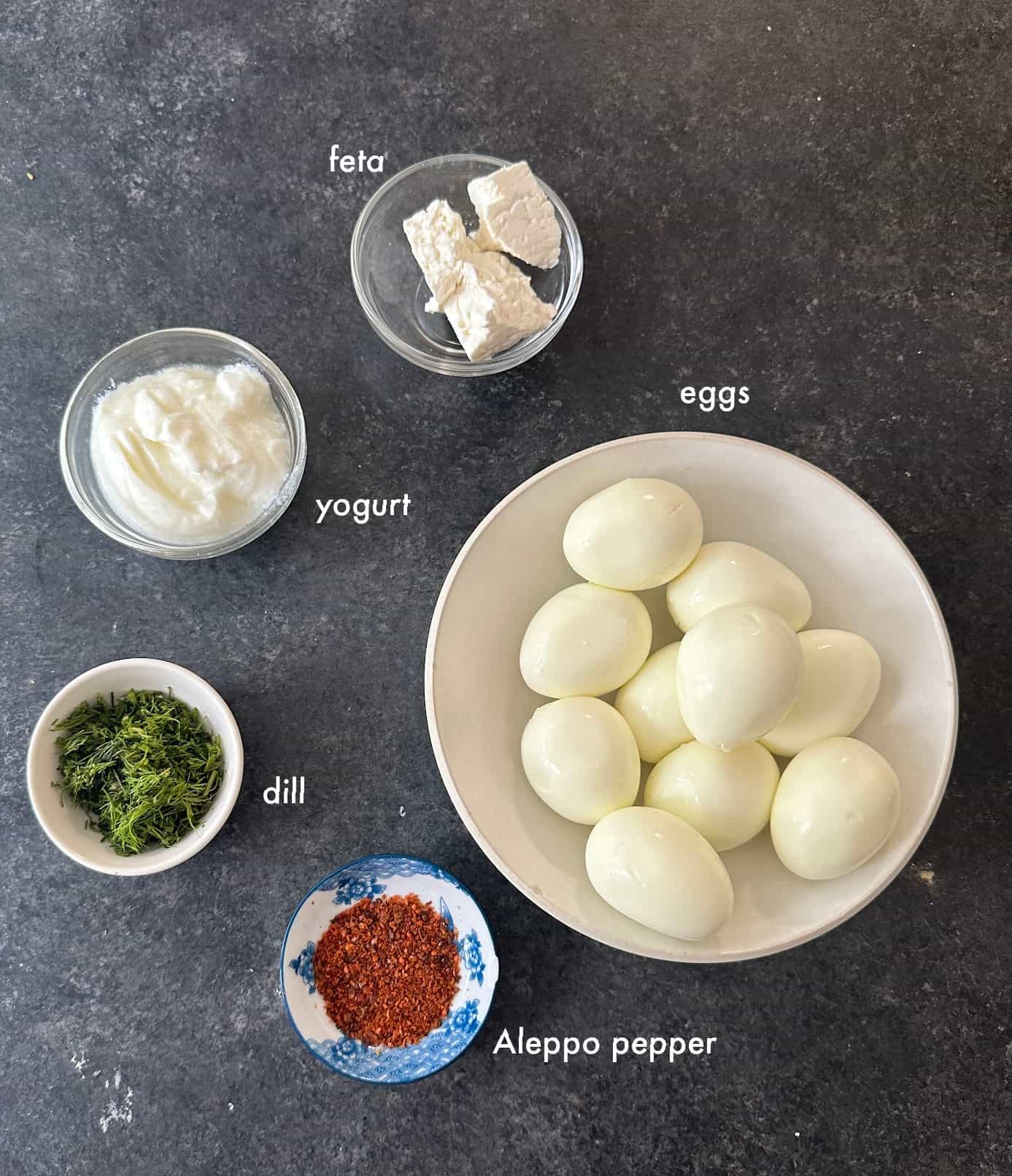 To make Mediterranean deviled eggs you need boiled eggs, aleppo pepper, yogurt, feta and dill. 