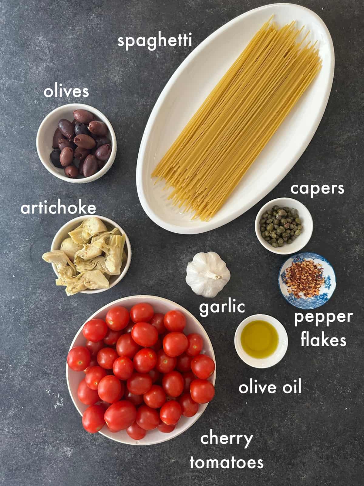 To make this recipe you need pasta, tomatoes, olive oil, garlic, artichokes and olives.