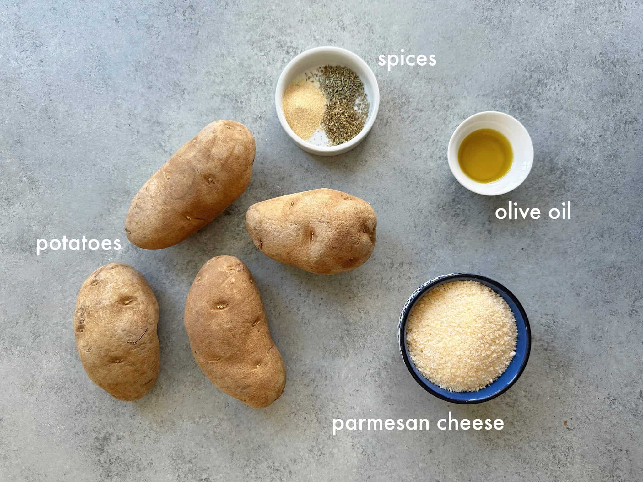 You need potatoes, parmesan, spices and olive oil.