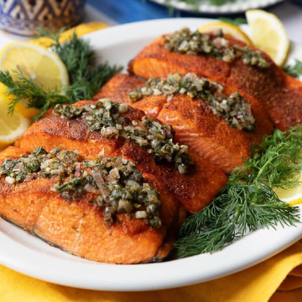 This quick and easy air fryer salmon recipe is ready in 10 minutes. The crispy salmon is served with a bright lemon dill sauce, making it extra delicious.