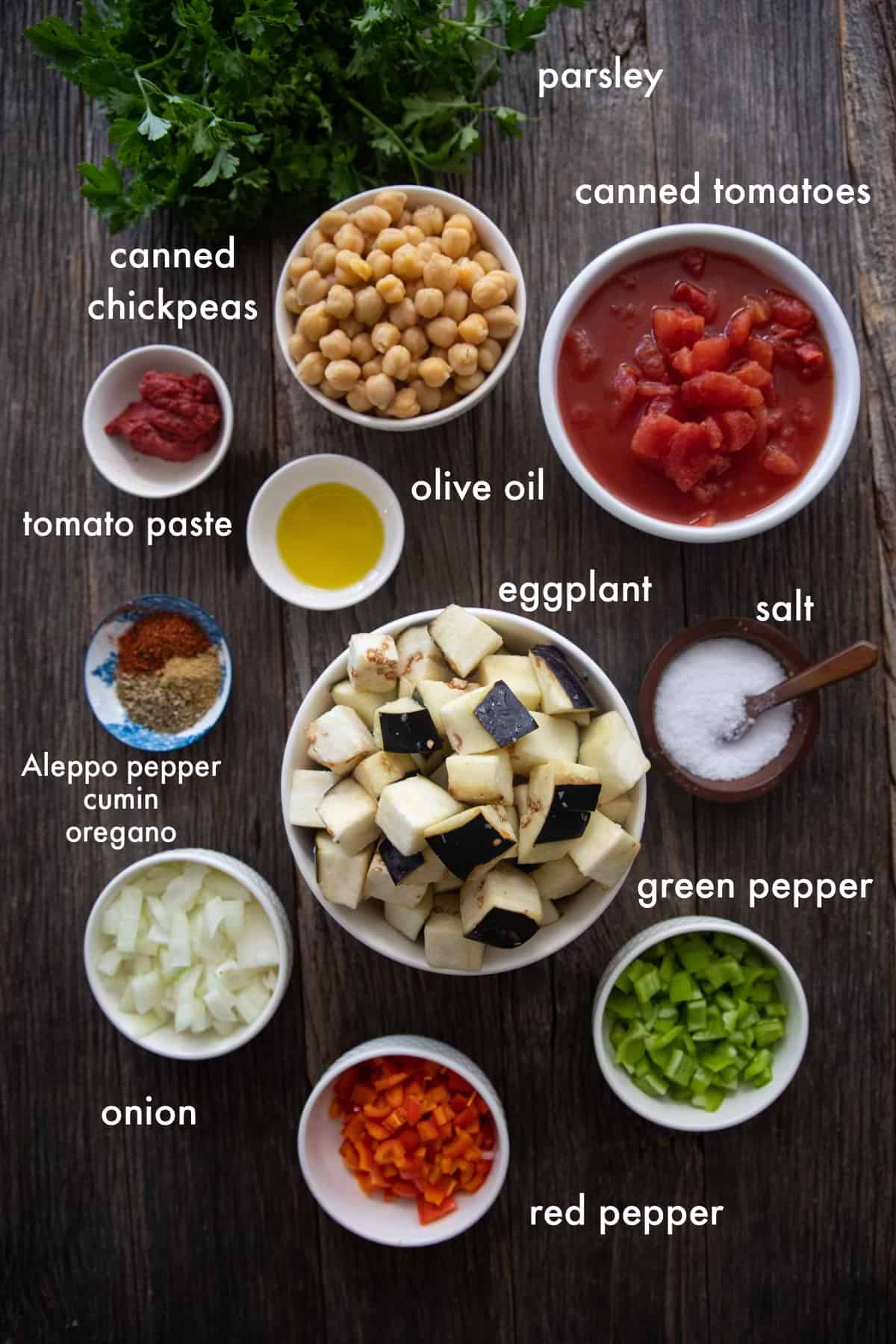 you need eggplant, olive oil, tomatoes, chickpeas, spices, peppers and tomato paste. 
