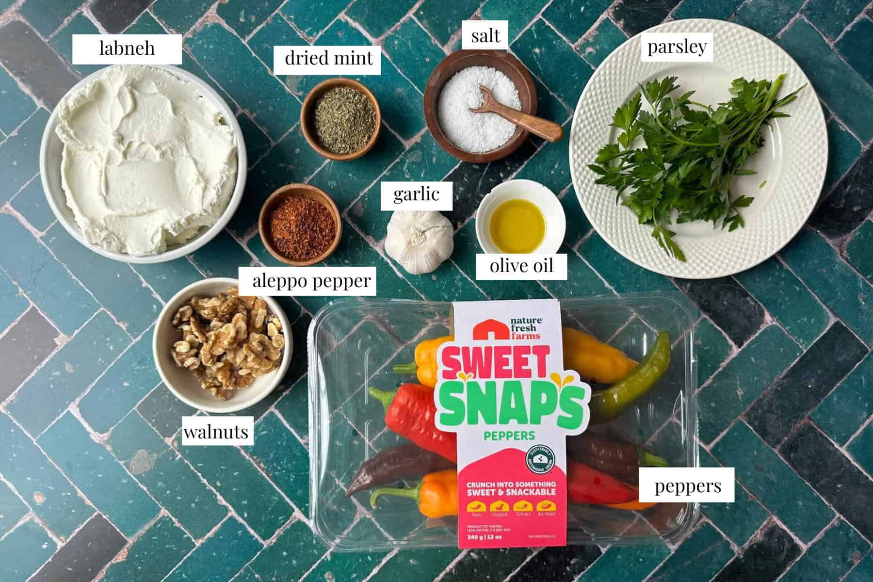 To make labneh dip you need peppers, olive oil, labneh, garlic, spices, walnuts and parsley. 