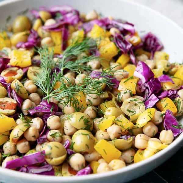 Mediterranean chickpea salad in white serving bowl