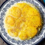 Persian potato tahdig: Crispy potatoes over saffron rice in an Iranian pot.