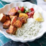 salmon rice bowl with Mediterranean veggie mix and dill rice