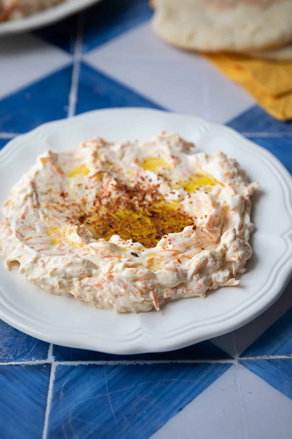 Classic Havuc Tarator classic Turkish carrot salad with yogurt in a white serving platter