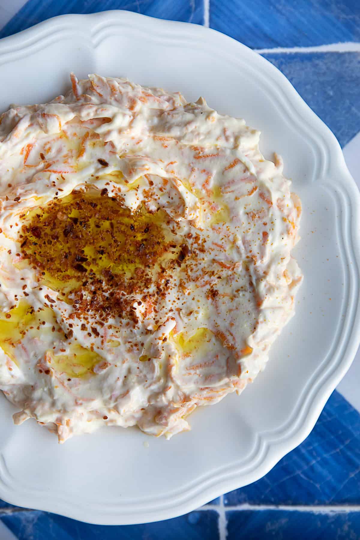 Turkish Carrot Salad with Yogurt classic Turkish carrot salad with yogurt in a white serving platter