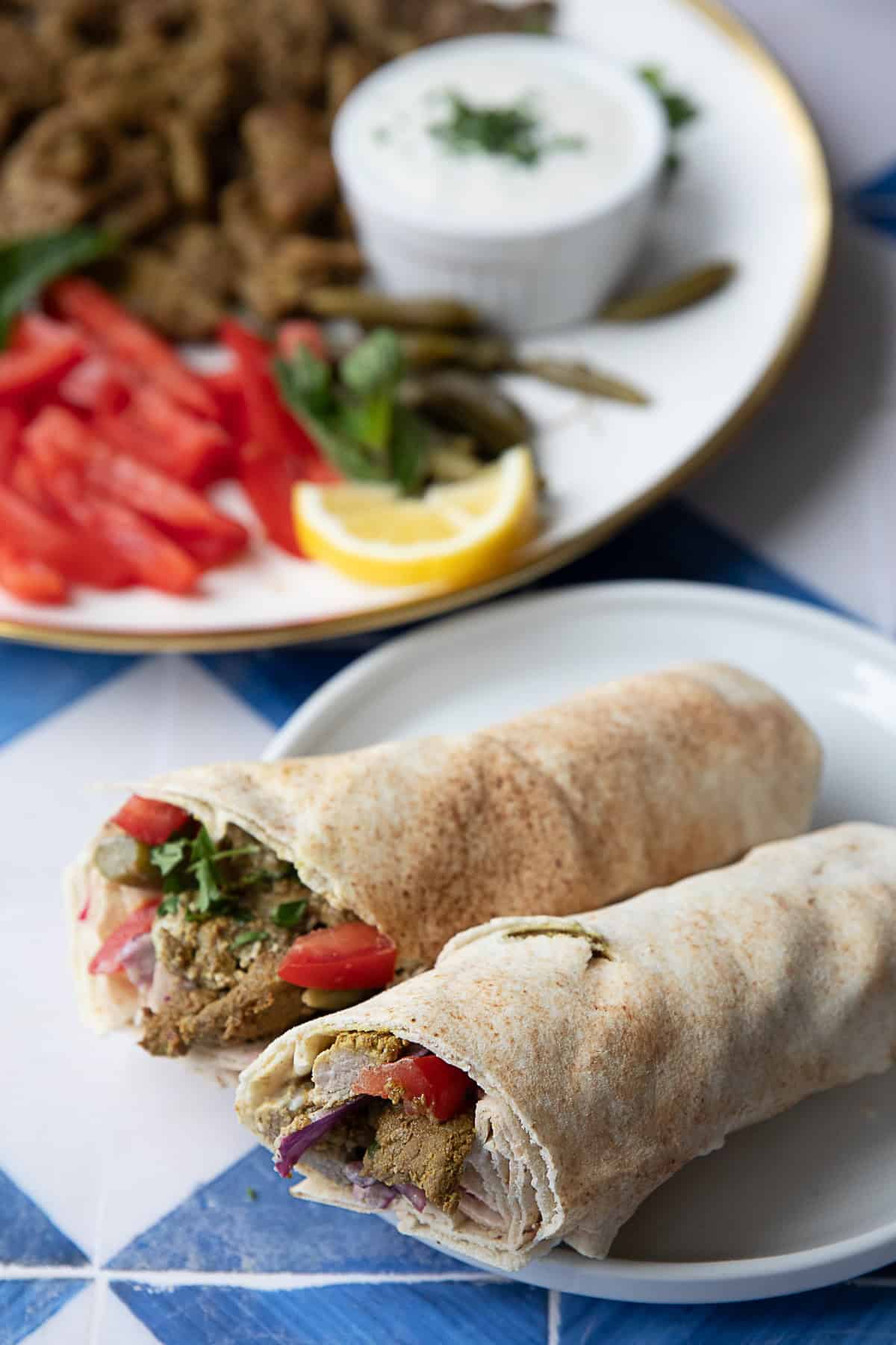 How to Make Lamb Shawarma Sandwich lamb shawarma served in a pita wrap with fixings